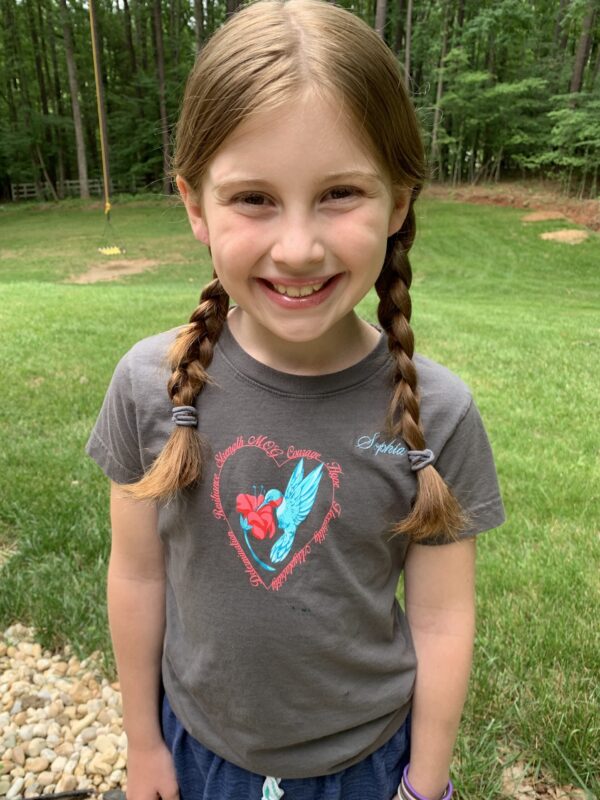 Sophia in her hummingbird t-shirt
