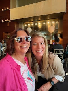 Andrea Mitchell and Candis at the Amgen NMOSD Patient Council Meeting in Illinois.