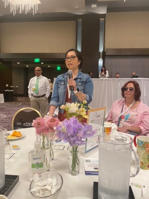 Irene, a MOGAD Patient asks a question at the Guthy Jackson NMO Patient Day.