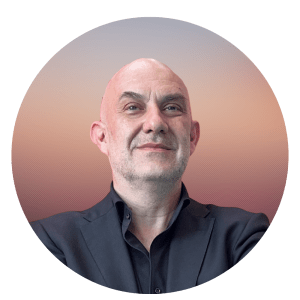 Dr Robert Bonek is shown with a black shirt and smiling. He has no hair and light skin.